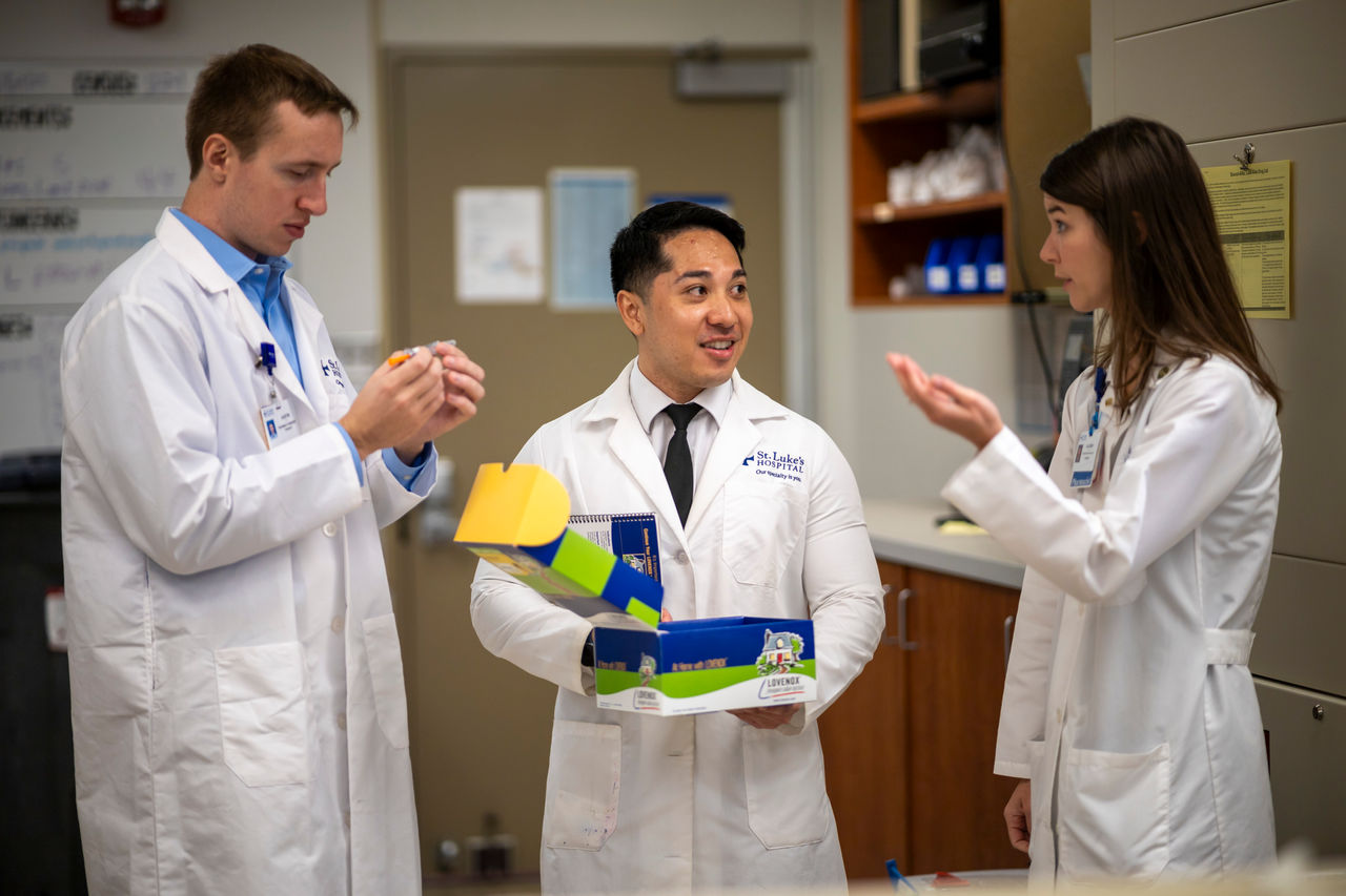 pharmacy residents in a discussion