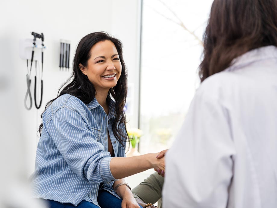 asian women patient with doctor